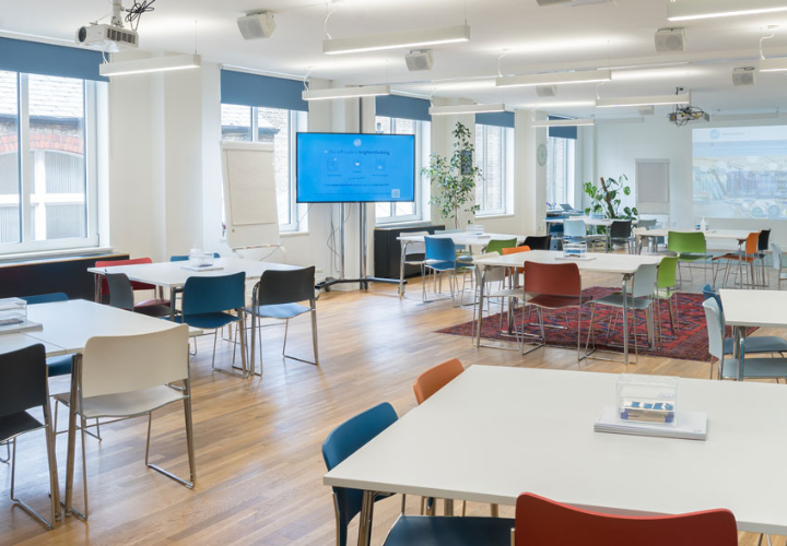 Training room at wallacespace showing tables and chairs